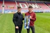 Bradd and Lucas Parfitt pictured at the DW Stadium, home of Latics.