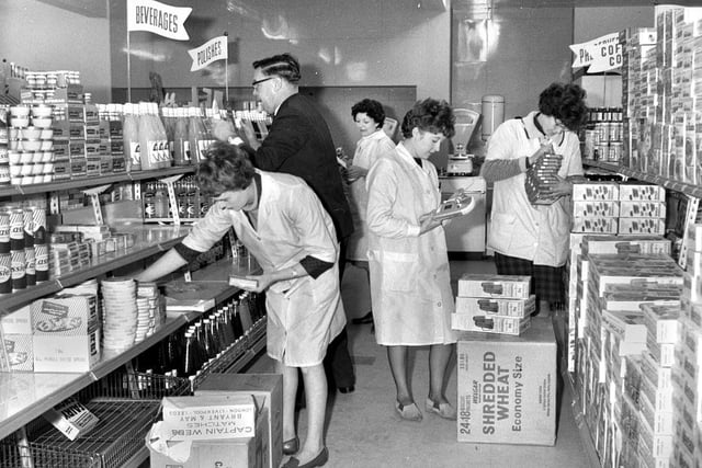 Stacking the shelves at the new Shevington Co-op supermarket in 1966.  