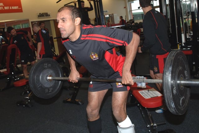 Mark Calderwood lifts the weights on his broken leg as Wigan Warriors resume training.