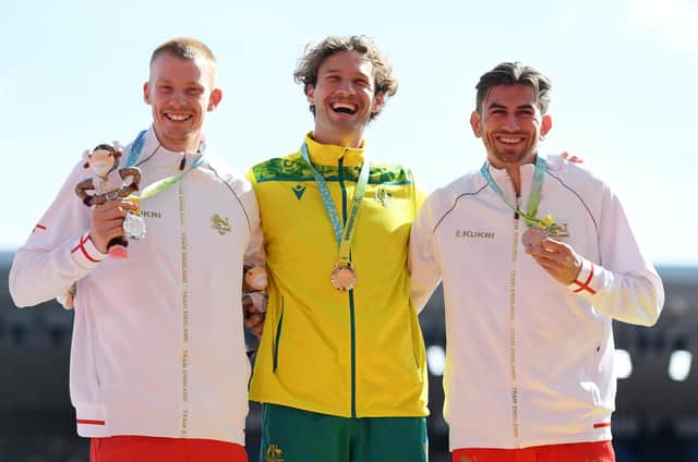 Harry Coppell celebrates his bronze medal at the Commonwealth Games
