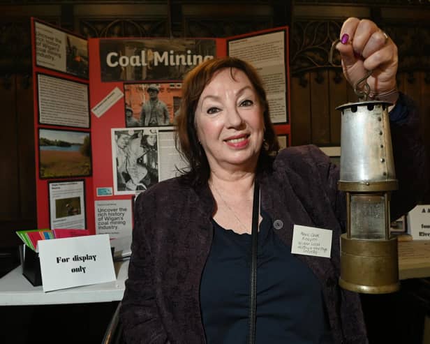 Marie-Clare Kenyon with the display on Wigan's coal mining industry