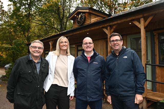 from left, Coun Chris Ready, The Hamlet head of provisions Gemma Crompton,  Stephen Hughes who volunteered his time and skills to help build the new building and Mayor of Greater Manchester Andy Burnham.