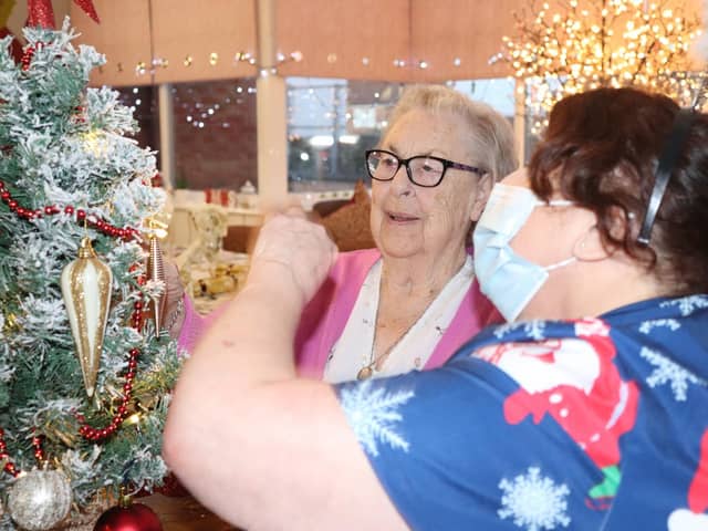 LEFT TO RIGHT: Ellen Nichols (Resident at Norley Hall) and Marie Hayes (Care  Assistant)