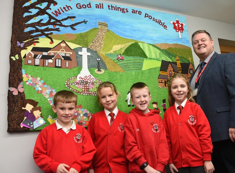 Headteacher Mr Smout picture with pupils.  "We wish for our school's theologically rooted vision to enable all children and adults to flourish. 
'We shine like stars to achieve and make a difference in the world, knowing that with God, all things are possible.' Matthew 19:26".