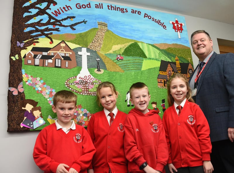 Headteacher Mr Smout picture with pupils. "We wish for our school's theologically rooted vision to enable all children and adults to flourish.
'We shine like stars to achieve and make a difference in the world, knowing that with God, all things are possible.' Matthew 19:26".
