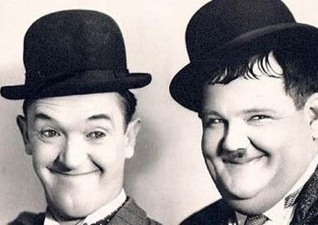 Vintage comedy duo Stan Laurel (left) and Oliver Hardy (right)