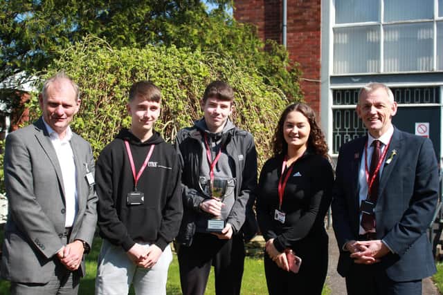 The winning team pictured with managing director of Allied Finance, Nick Wylie, and principal, Peter McGhee.