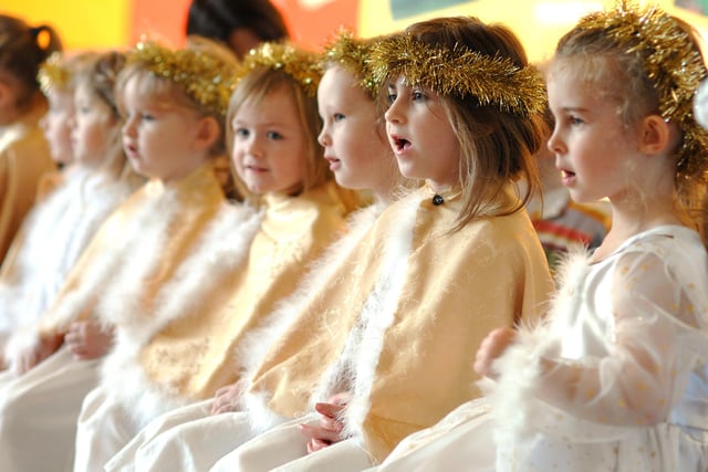 St Jude's Catholic Primary School Reception and Nursery children in costume for A Wriggly Nativity.