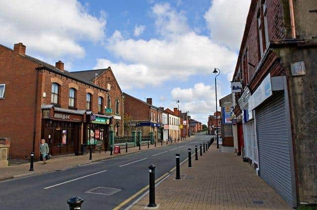 Golborne High Street where a child was hit by a car