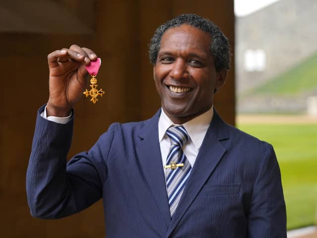Lemn Sissay after being made an OBE by the Prince of Wales