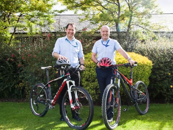 Gary Wilkes and Jason Carr with bikes at the ready