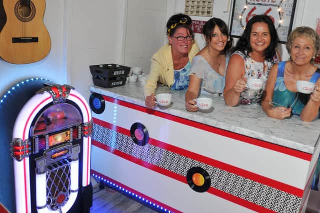 Margaret Grady, Marie Parkinson and Kim Jones in the new 1950's American diner style hut at Montrose Hall Care Home, Wigan.