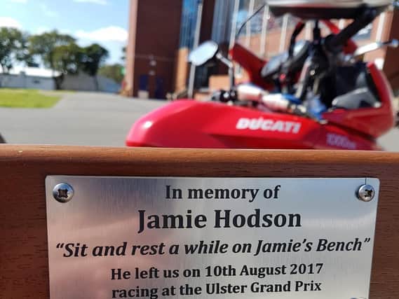 The inscription on the memorial bench to Jamie Hodson