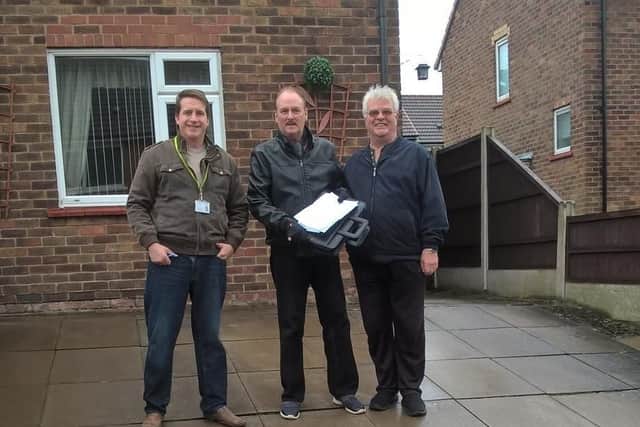 Bryn Independent councillors Steve Jones and Andrew Collinson with Grange Road resident David Parkinson