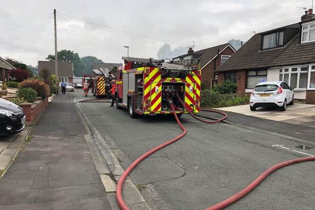 Firefighters tackle the blaze at the Shevington home
