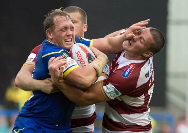 The Warriors defence struggle to deal with Warrington's Ben Westwood