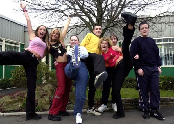 2001: TKO band members, Katie, Dizzy and Emma encourage Montrose School pupils to pursue a singing and dancing career