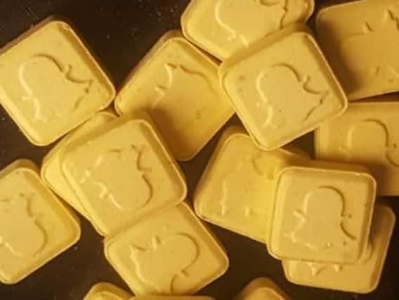 No specific images have been released of the Snapchat pills in question, although some examples are described as small, yellow, brick-shaped tablets bearing the mobile app's logo.