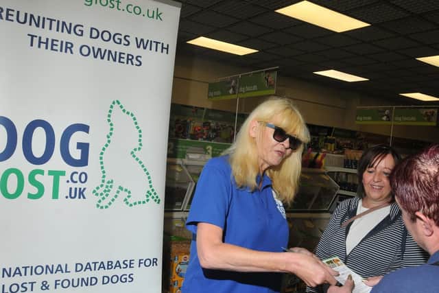 Jayne, founder of Dog Lost UK, offers information and advice to shoppers at Pets at Home