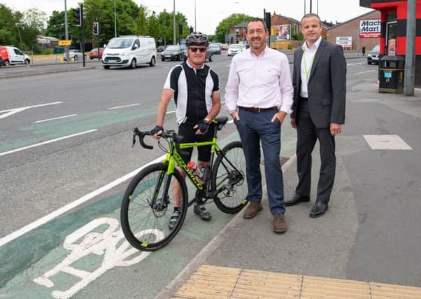 Chris Boardman with Coun Carl Sweeney and local cyclist David Stanley