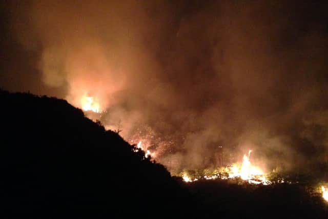 The fire rages through the night at Saddleworth Moor