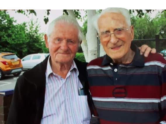 Peter Moore (left) and older brother Francis, aged 102, have been reunited after 83 years