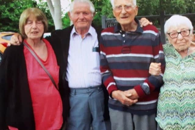 Peter Moore with his long-lost brother Francis, and the latters wife Eve, aged 95, and their daughter Carol