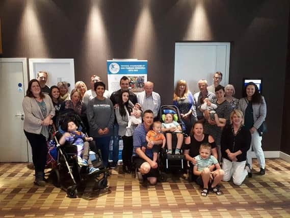 NKH families meet three of the leading researchers into the condition during a summit in Manchester
