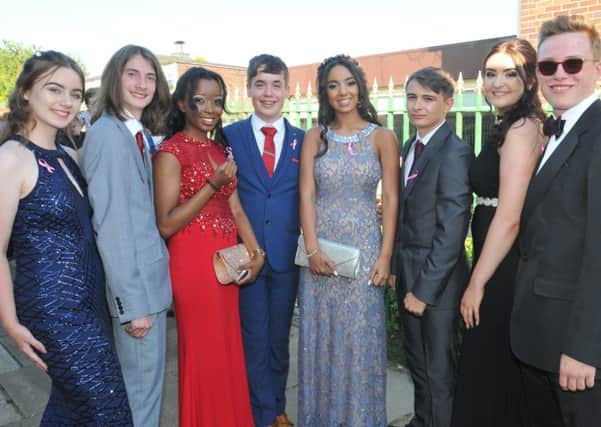 Some of the senior prefects from St John Fisher High School get ready to leave for their prom wearing ribbons in memory of classmate Lucy Davies, who died after contracting sepsis while battling leukaemia.