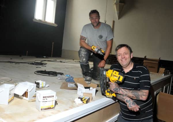Joiner Steven Penk and Derek Eccleston, facilities manager at The Old Courts