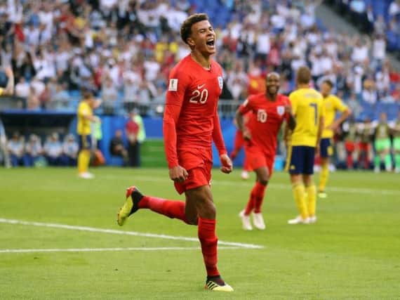 Dele Alli celebrates scoring England's second goal against Sweden.