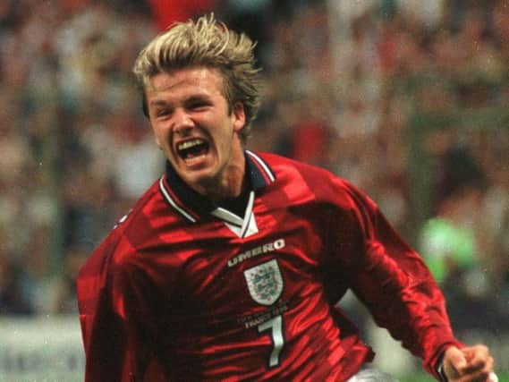 David Beckham celebrates scoring for England against Colombia at France 98