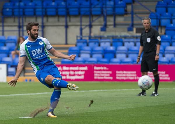 Will Grigg opens the scoring at Tranmere