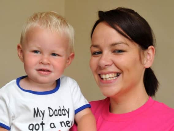 Louise Hughes and son George, wife and son of Dave Hughes who died after a transplant in May