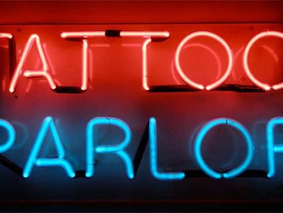 A correspondent says we are lucky to live in a country where  we can express our own taste. What do you think of tattoos?