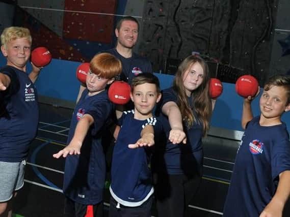 Coach Matthew Melling with some of the Wigan Youth Zone dodgeball team