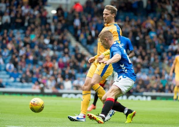 Nick Powell in action for Wigan Athletic at Rangers