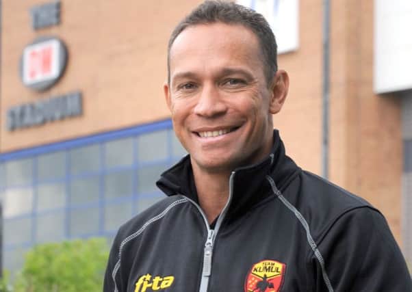 Adrian Lam pictured at the DW Stadium ahead of the 2013 World Cup when he was PNG coach