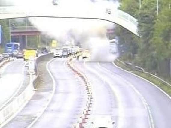 Smoke billowed out from the flaming vehicle