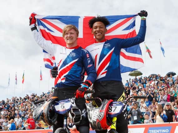 Gold medalist Kyle Evans (left) with team-mate Kye Whyte