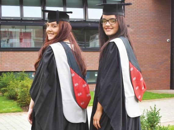 A Wigan higher education college is celebrating a successful first year after being granted university status.
