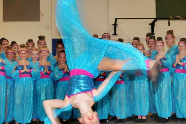 Amber Marsden shows off her acrobatic skills