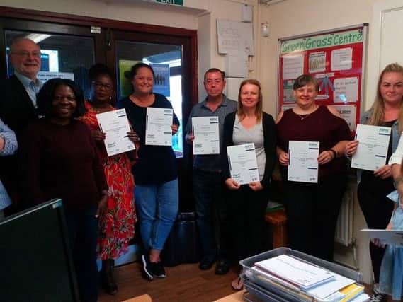 The alcohol health champions getting their certificates