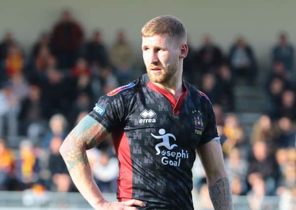Sam Tomkins wearing the Joseph's Goal shirt in Wigan's game at Catalans earlier this year
