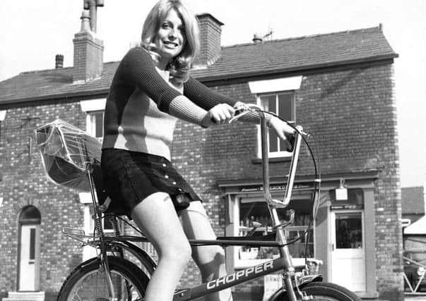 The Raleigh Chopper MK 2 bike which was very popular in the 1970s is tested out by Jenny Brown, aged 21, from Holme Terrace, Wigan, at Rogerson's bike shop at Orrell Post where it was introduced in 1972