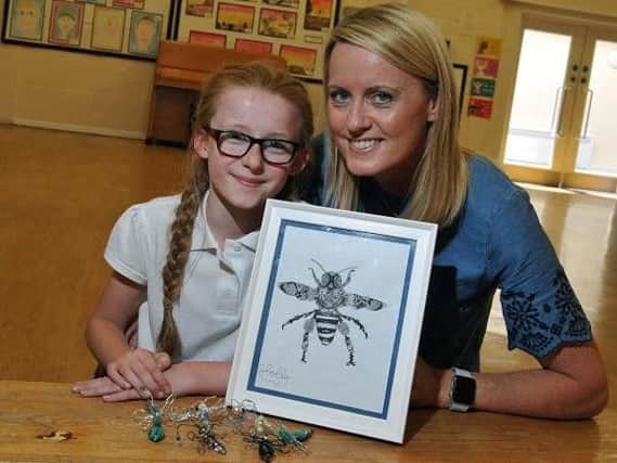 Young artist Holly Capstick, 10 with her mum Sue Capstick