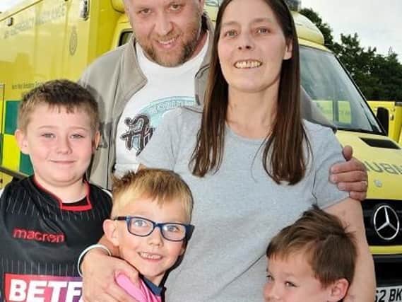 Lisa Fildes and her family, husband Craig and sons, from left, Connor, Thom and Ethan