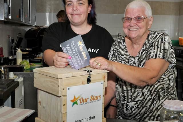 Volunteers at the Chapter One Cafe Hindley Community Centre, Clare Chislett and Kathy Lightfoot place their nomination for the Our Stars celebrations