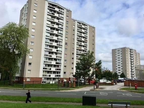 The high-rise flats in Scholes, which would be one location for the proposed sprinkler system
