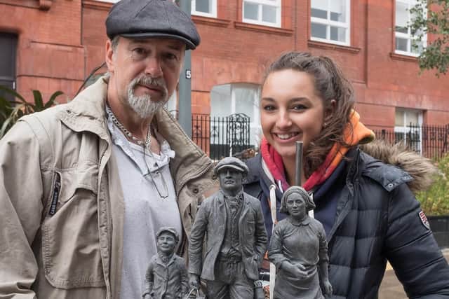 The maquette of the mining statue - artist Steve Winterburn and his daughter Roxy